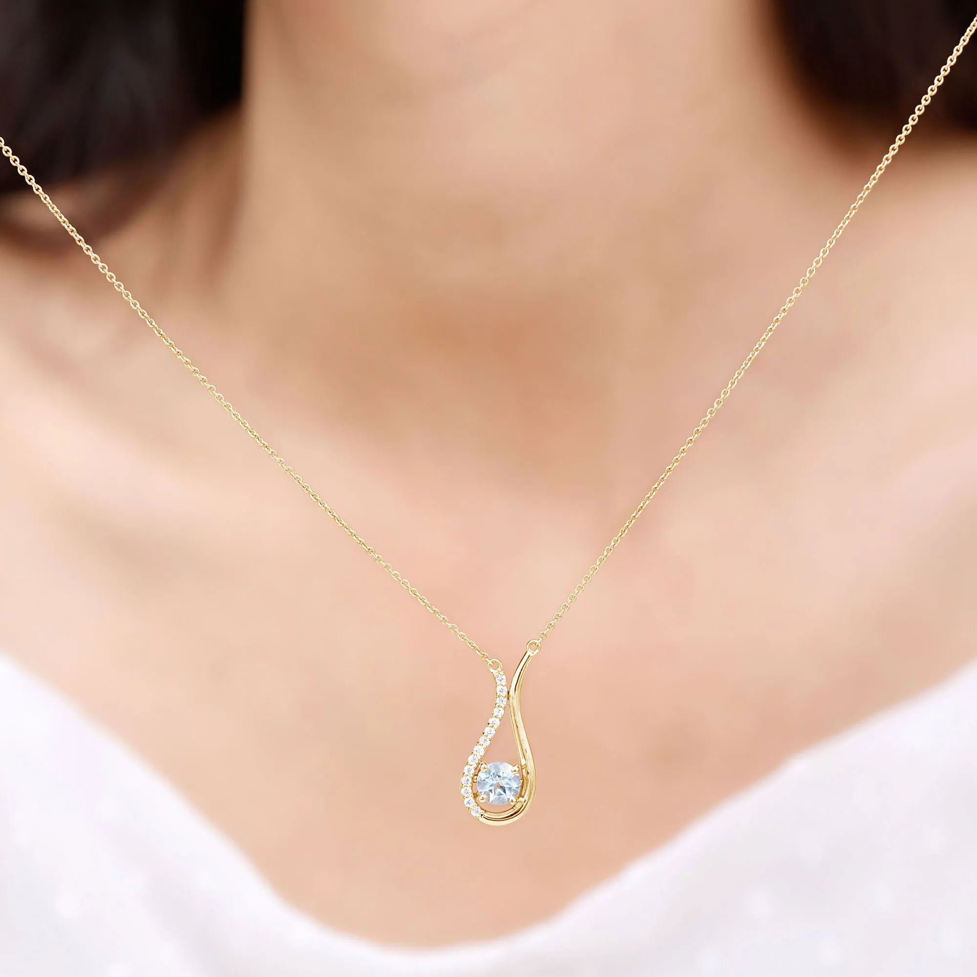 1 CT Sky Blue Topaz and Diamond Teardrop Pendant Necklace