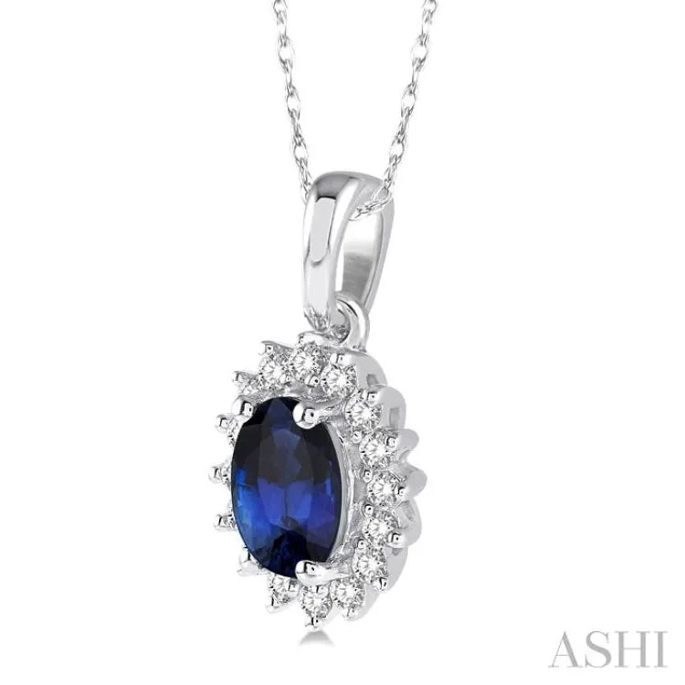 1/8 Ctw Round Cut Diamond and Oval Cut 6x4 MM Sapphire Center Sunflower Precious Pendant in 10K White Gold with chain