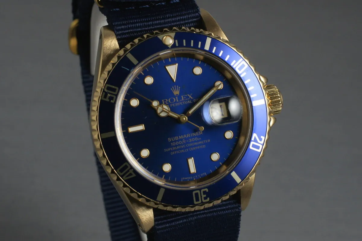 1991 Rolex 18K Blue Submariner 16618 with Box and Papers