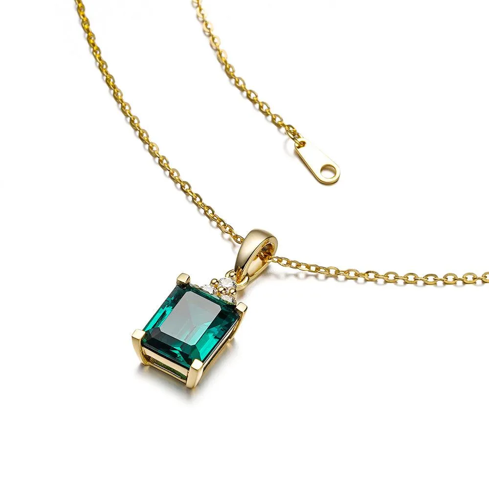 4 CT. Emerald-Cut Emerald Pendant With Trio Moissanite Diamonds