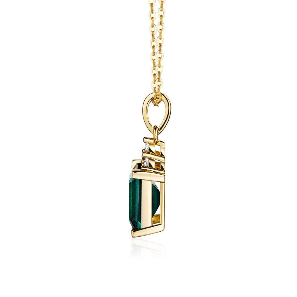 4 CT. Emerald-Cut Emerald Pendant With Trio Moissanite Diamonds