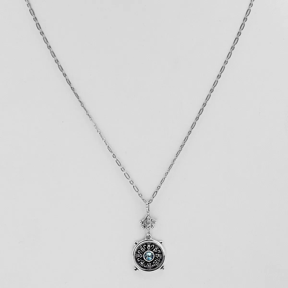 Dharmachakra Sterling Silver Blue Topaz Grace Necklace