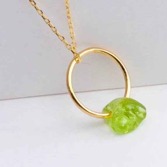 Rough stone peridot pendant