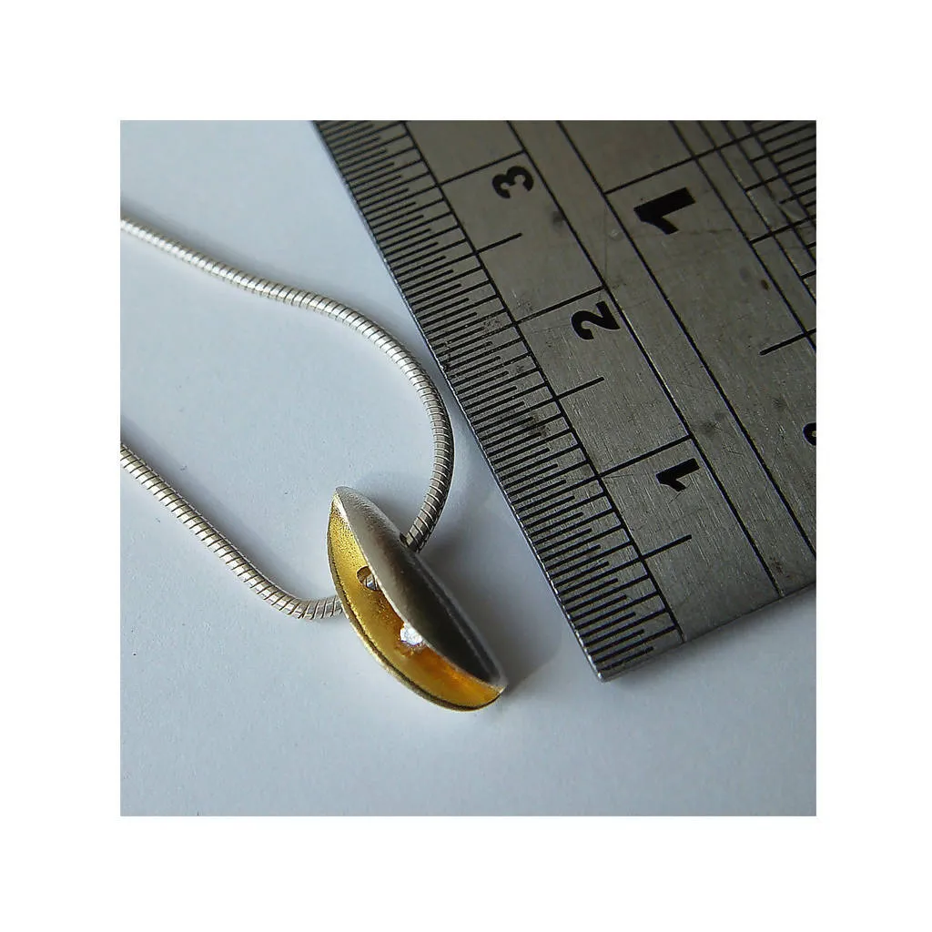 Small side diamond silver shell pendant with 18K gold plated interior